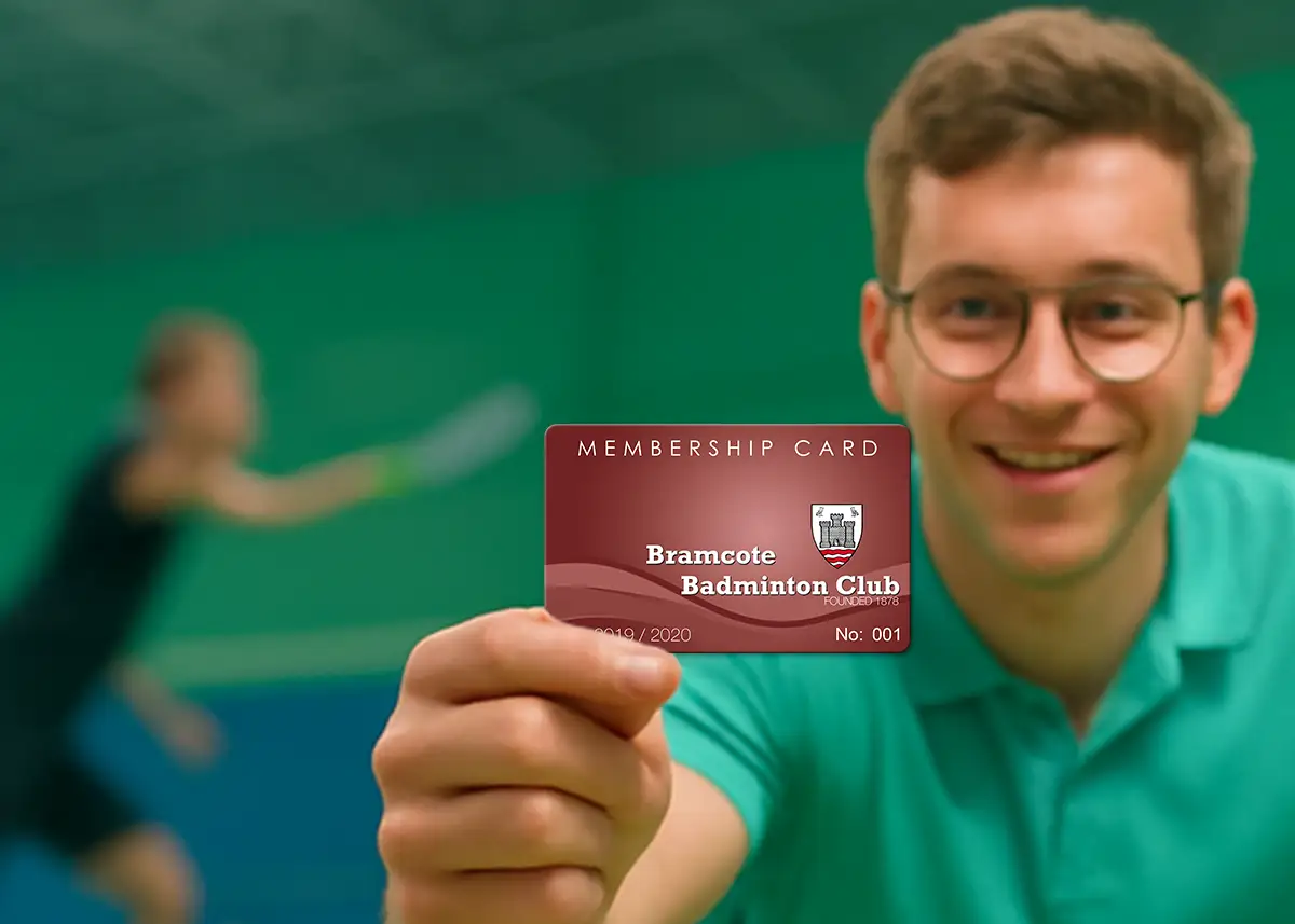 a printed plastic card for a badminton club logo